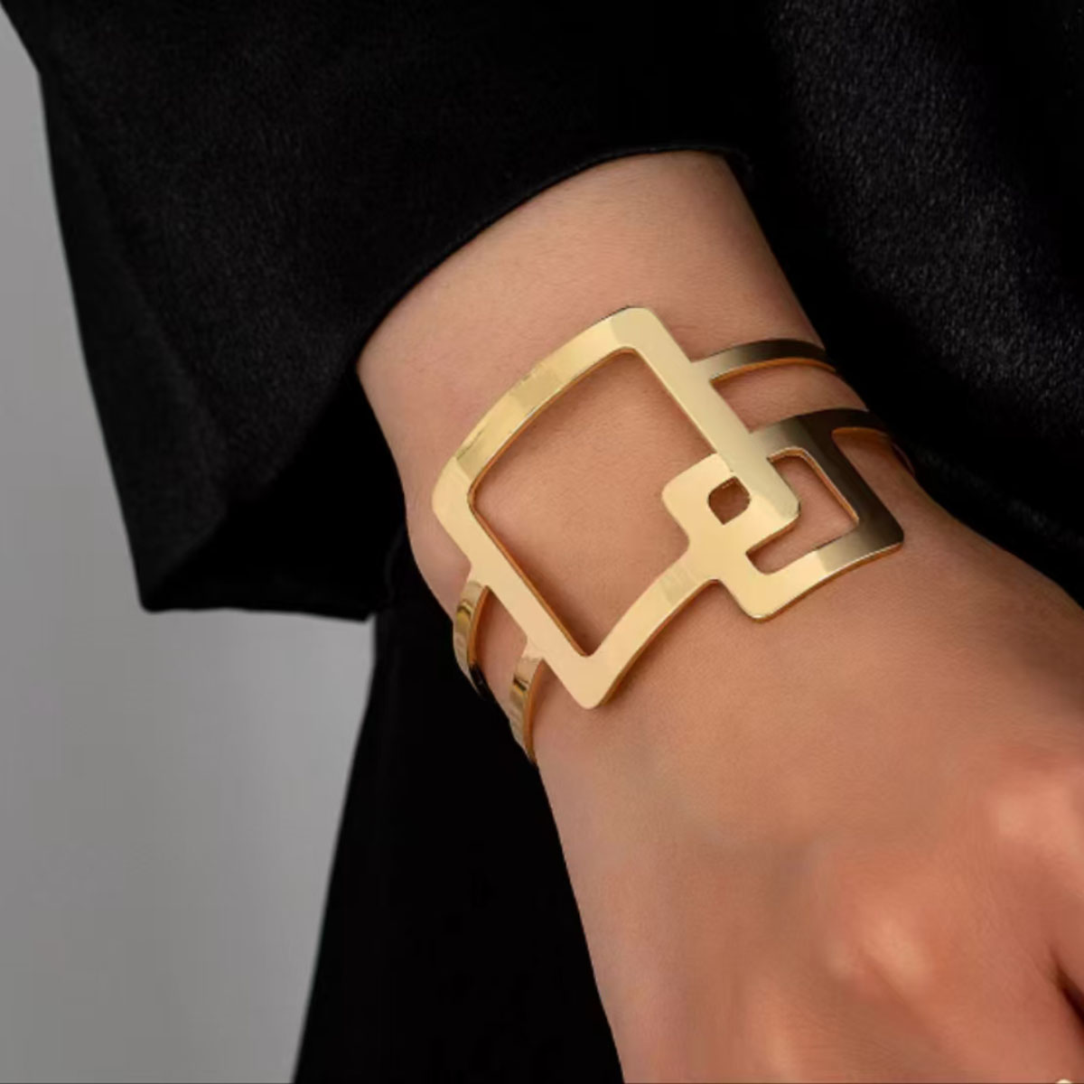 Elegant Metal Circular Pattern Bracelet - Modern Edgy Wide Band Jewellery Perfect for Urban Wear