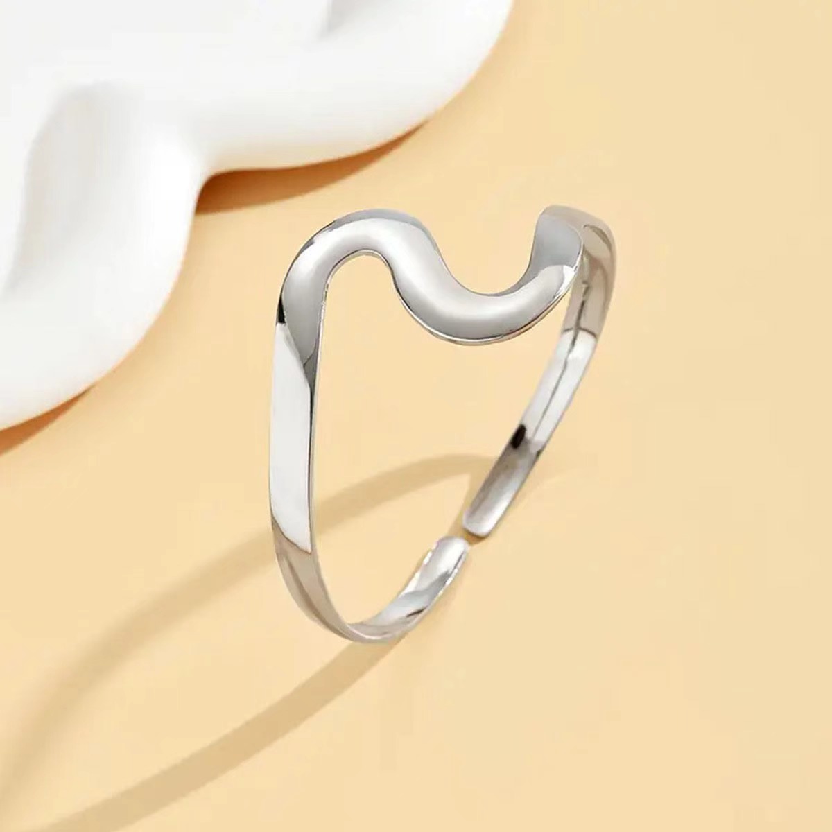 Sleek Circular Motif Metallic Bangle Edgy Wide Band Jewelry Piece Embracing Global Streetwear Styles