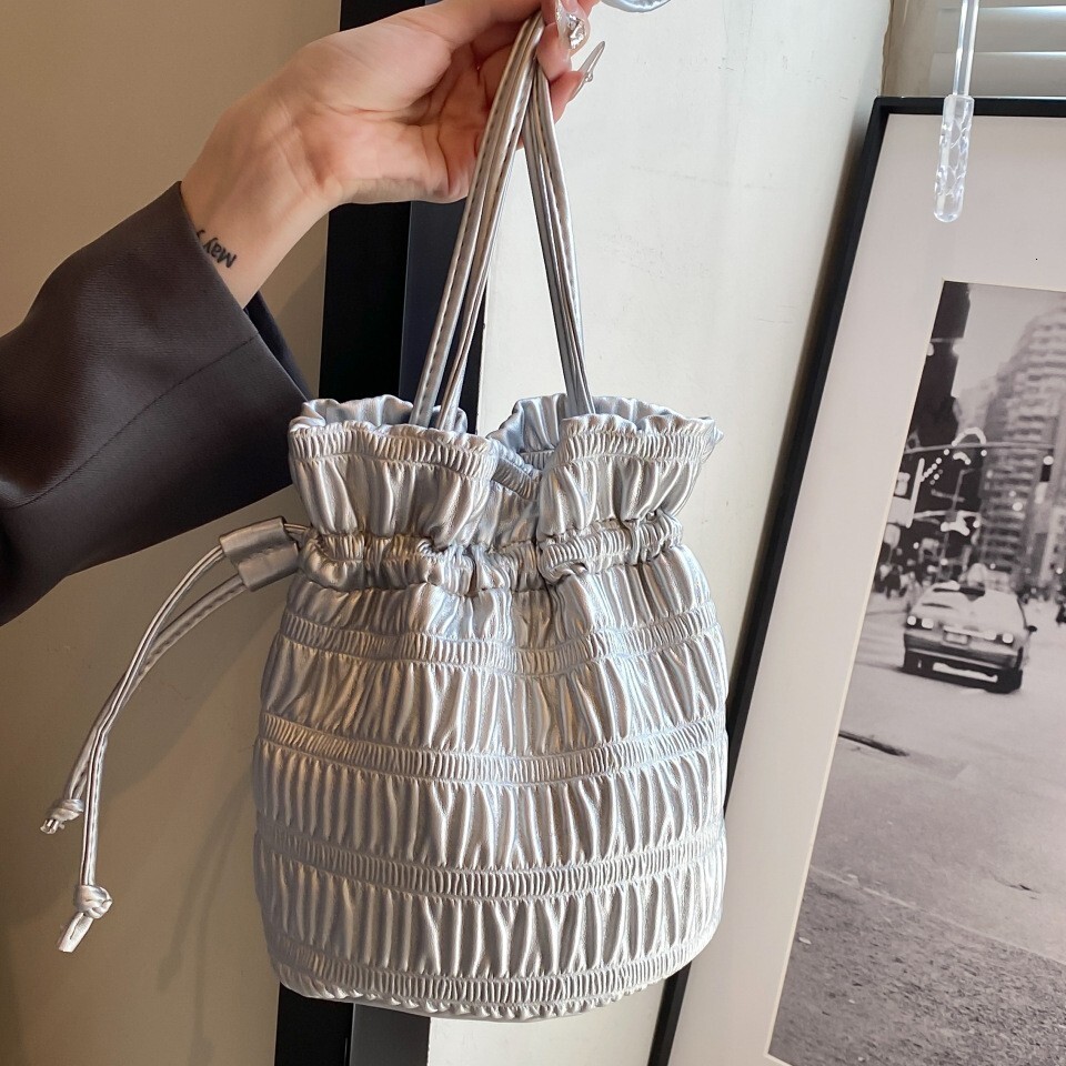 Bag for women new niche design shoulder simple and versatile drawstring bucket lazy pleated bag