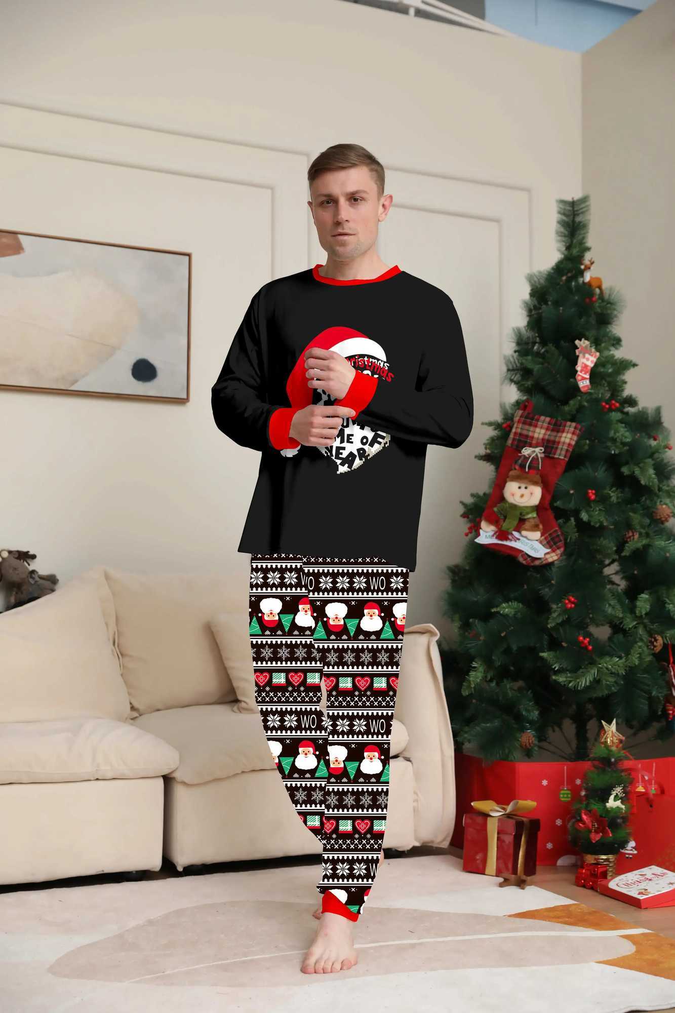 2024 Winter Santa Allover Printed Family Matching Set for Parents and Children 2-piece Baby and Dog Hoodies Christmas Pajamas Soft and Cute W241015
