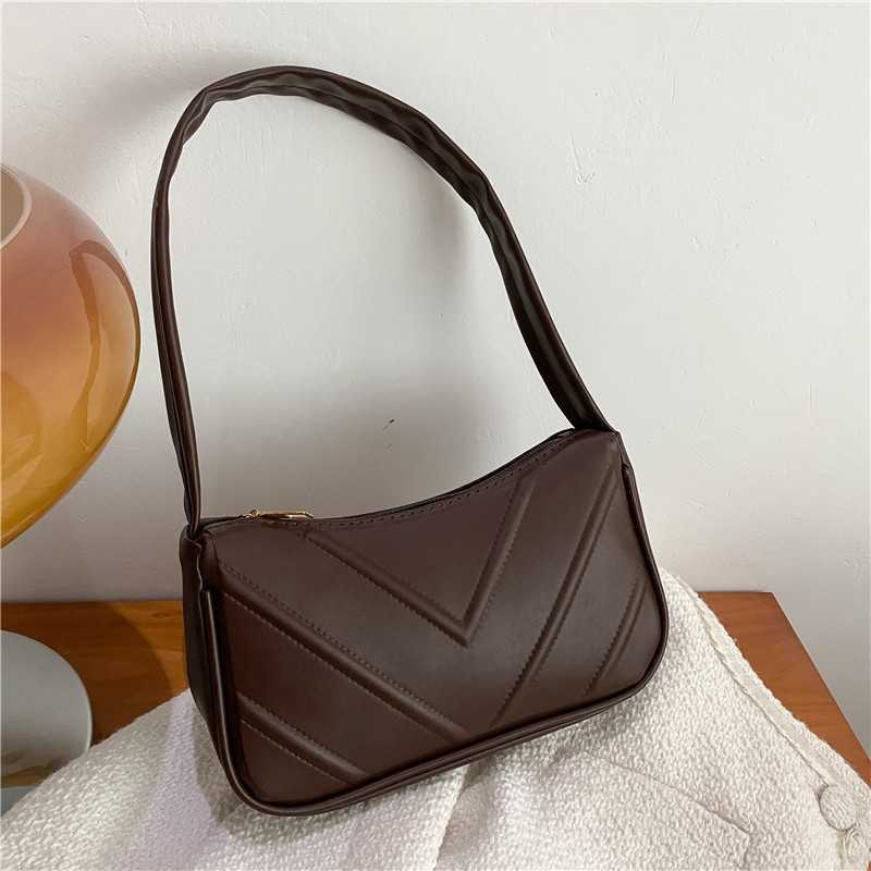 Subtle design temperament womens armpit baguette bag trend 2024 new western-style single shoulder hand-held small bag for women Y241017