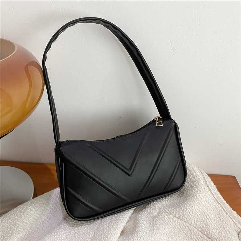 Subtle design temperament womens armpit baguette bag trend 2024 new western-style single shoulder hand-held small bag for women Y241017