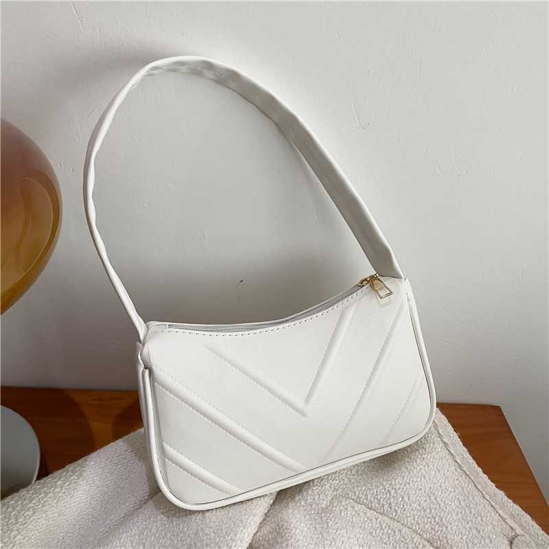 Subtle design temperament womens armpit baguette bag trend 2024 new western-style single shoulder hand-held small bag for women Y241017