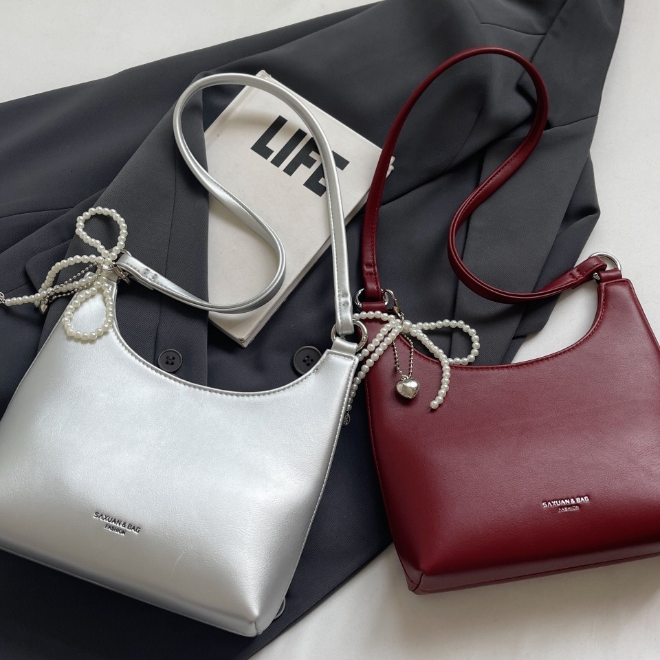 Handheld red female new trendy niche armpit bag, high-end western-style single shoulder crescent bag