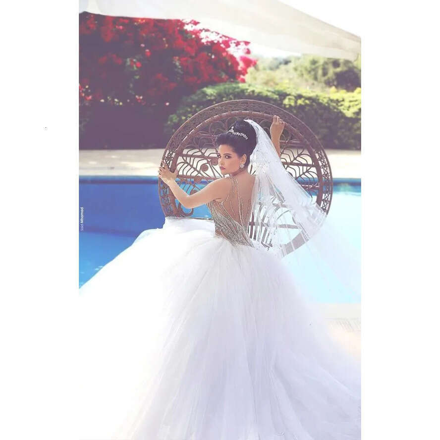 Crystals Gorgeous Mor Beading Ball Gown 2020 Wedding Dresses Crew Sheer Neck Sexy Back Puff Tulles Bridal Gowns Arabic s