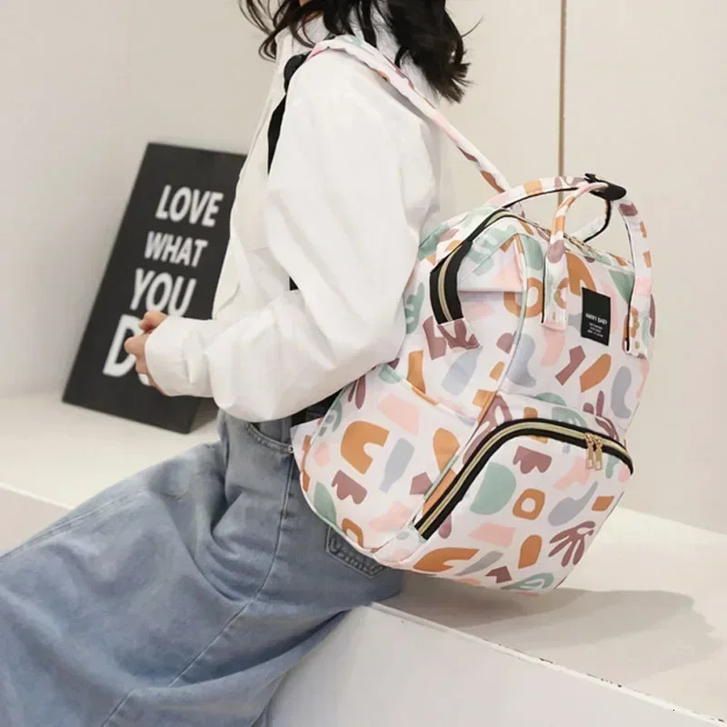 Fashionable printed pajamas backpacks mummies large capacity bags multifunctional outdoor travel for mothers and babies baby care products 241017