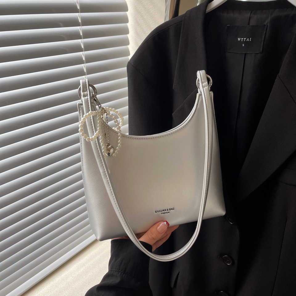 Handheld red female new trendy niche armpit bag, high-end western-style single shoulder crescent bag