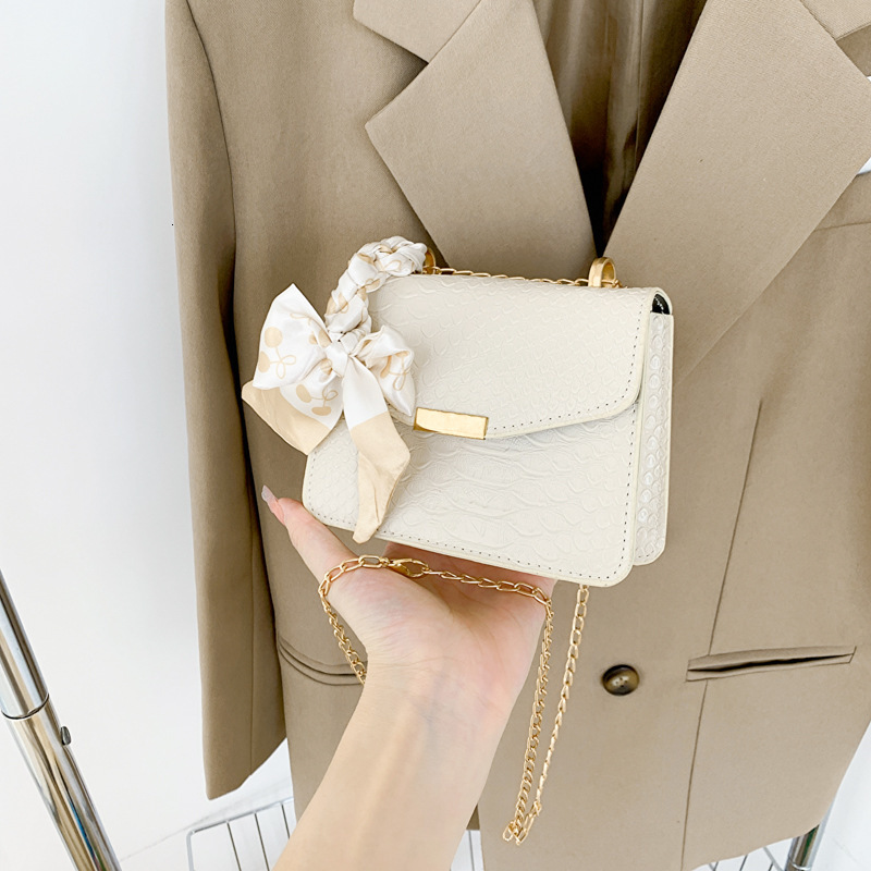 Mini solid color crossbody bag, women's autumn and winter new style, trendy texture, ribbon chain small square bag