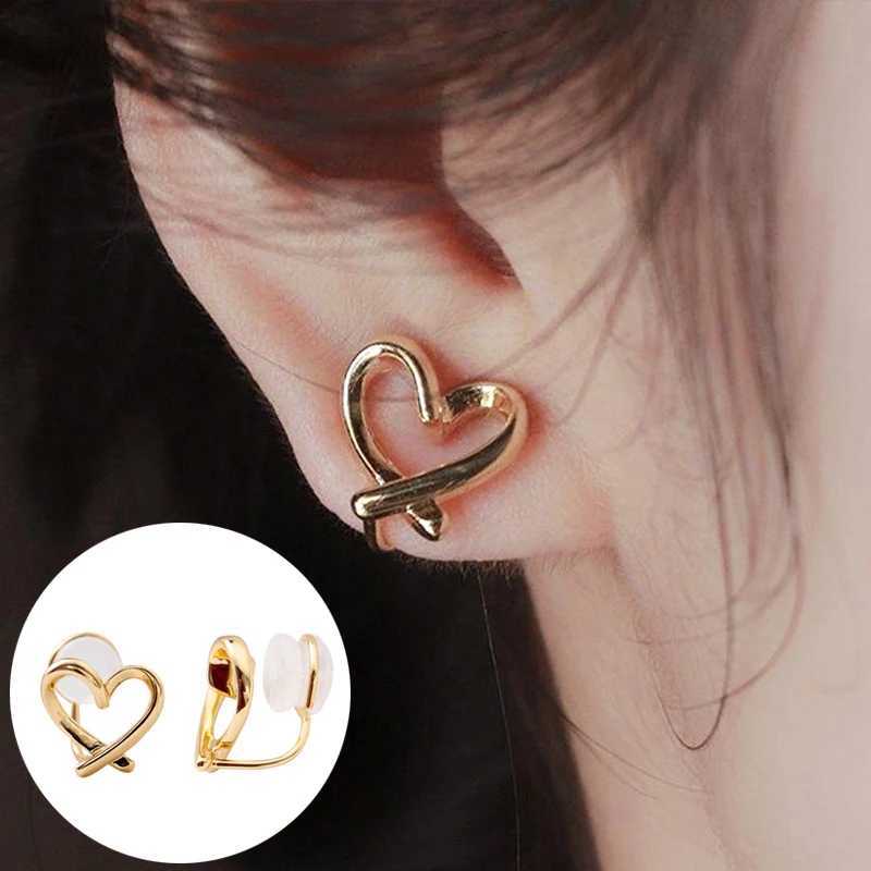 Korean hollow heart-shaped ear clip female ear clip non perforated silicone ear studs fashionable irregular jewelry gifts W241017