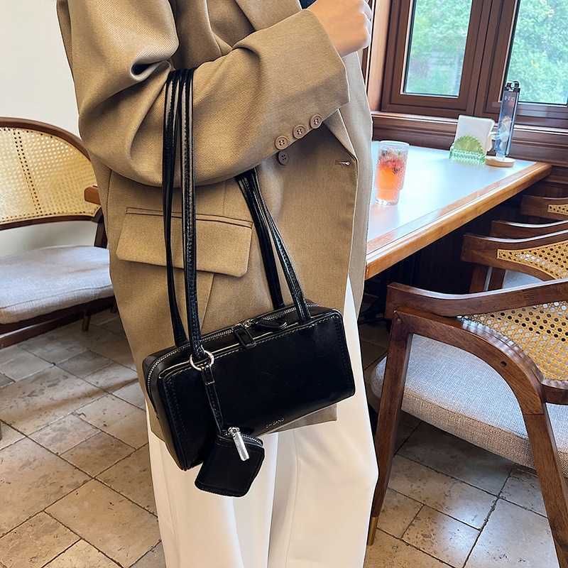 2024 new womens single shoulder and armpit bag simple mother and child bag handbag temperament 1version niche design small square bag Y241017