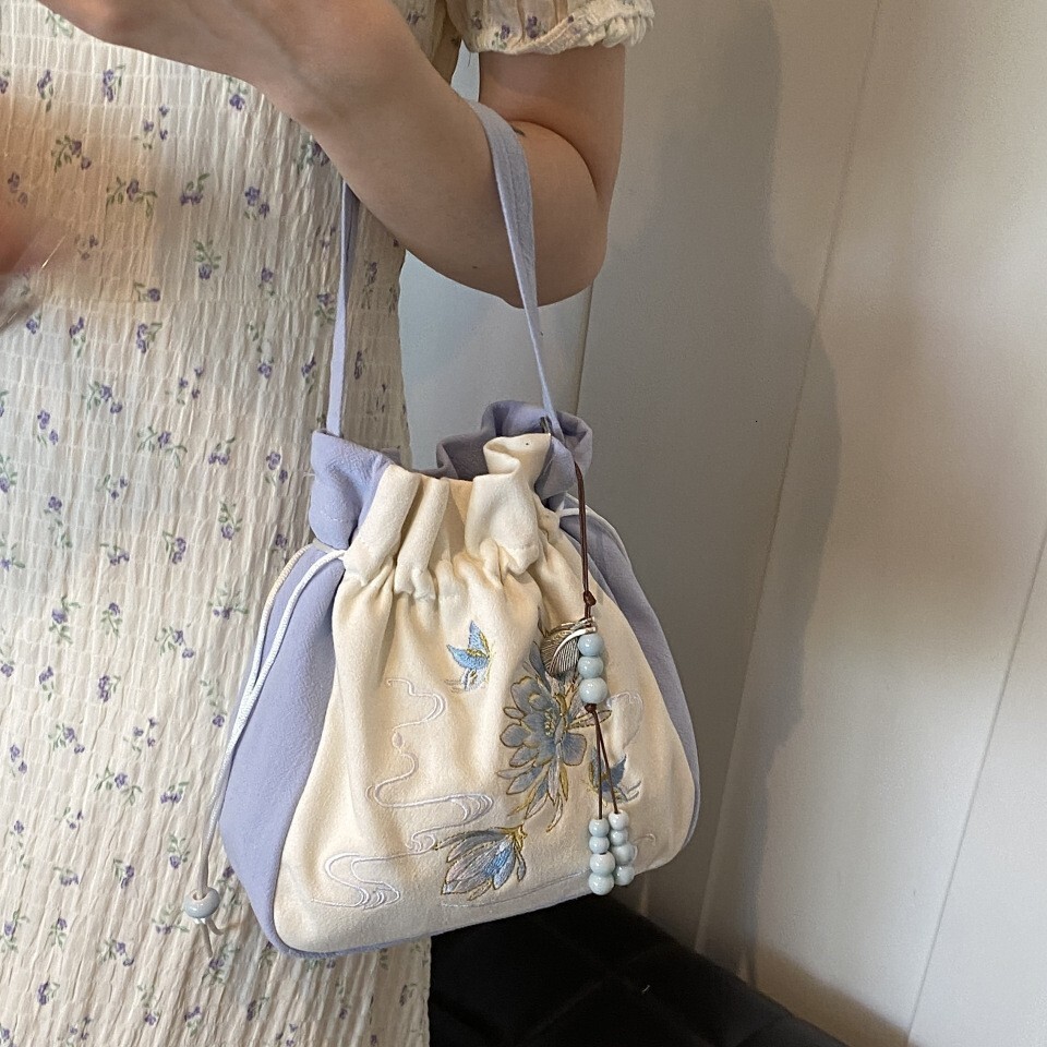 New Chinese style artistic embroidery bucket women's versatile large capacity crossbody bag, high-end and niche handbag