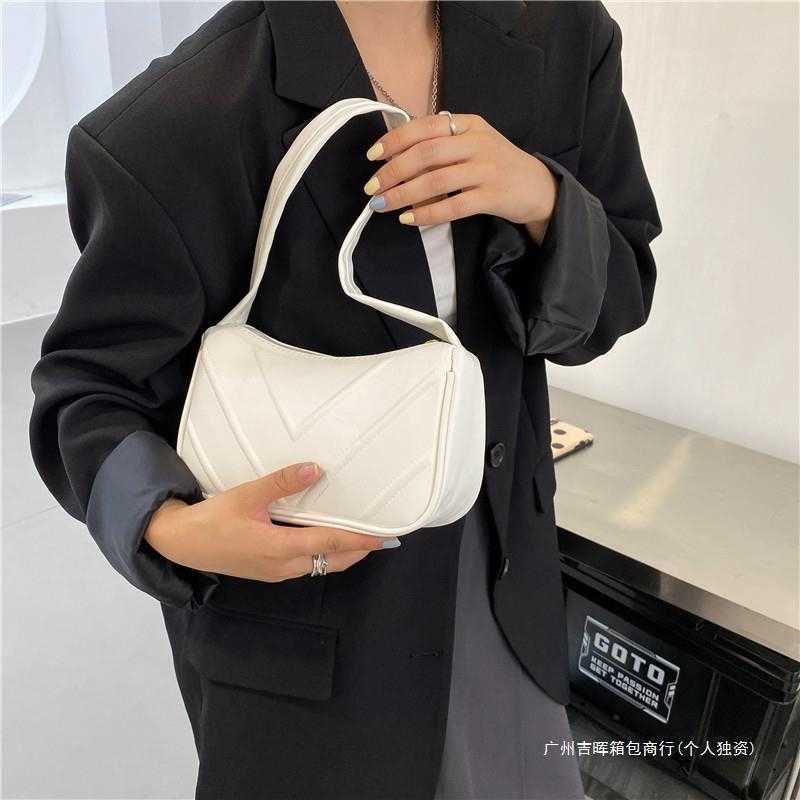 Subtle design temperament womens armpit baguette bag trend 2024 new western-style single shoulder hand-held small bag for women Y241017