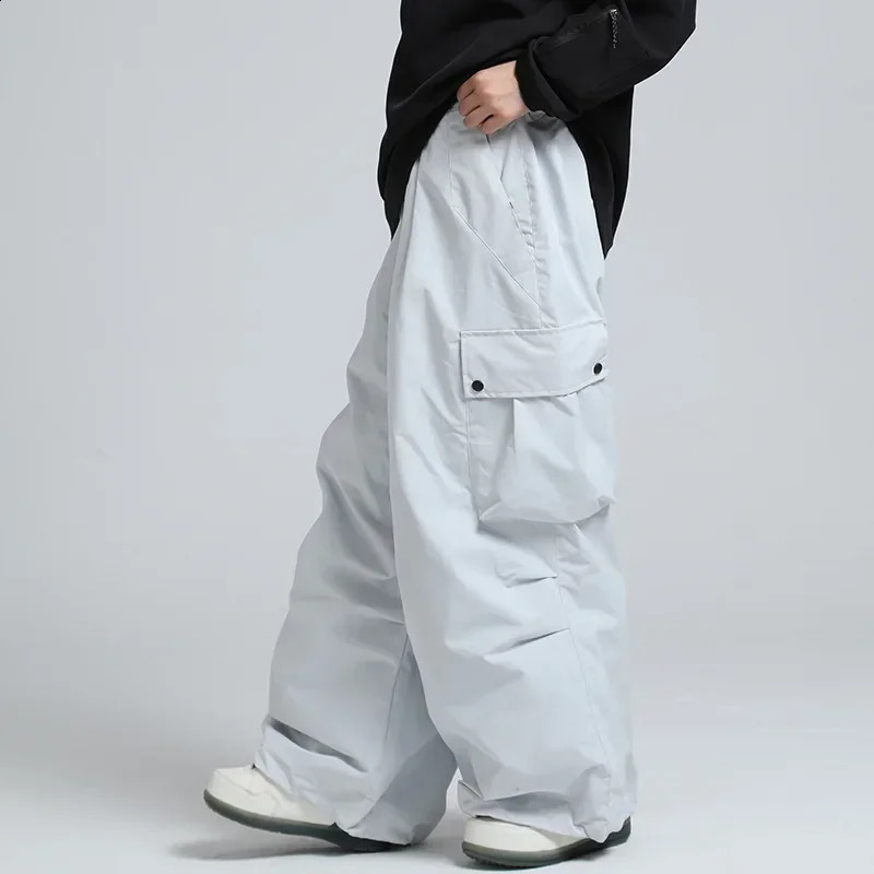Men Jumpsuit Winter Outdoor Snow Trousers Women Loose Snowboard Wear Waterproof Windproof Skiing Pants Warm Female Ski Clothes 241010
