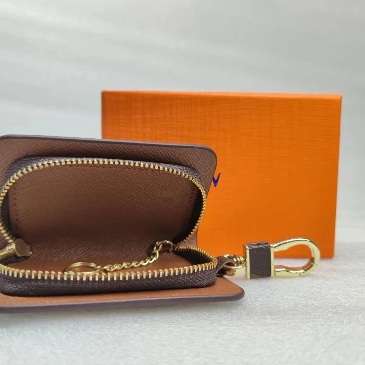 Designer men Universal Car Key bags Case unisex Male Genuine Leather Key's Holder Women Zipper Smart Keychain Cases Cars Keys Pouch Bag Wallets 2024