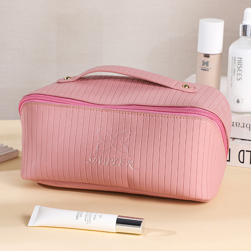Tote bag new vertical stripes storage cosmetic bag large capacity senior sense of cute face value travel portable organizer bag a from