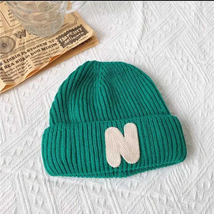 ins Childrens hats Autumn/Winter N letter stick cloth knitted hats for boys and girls cute warm bun wool hat trend LX241018