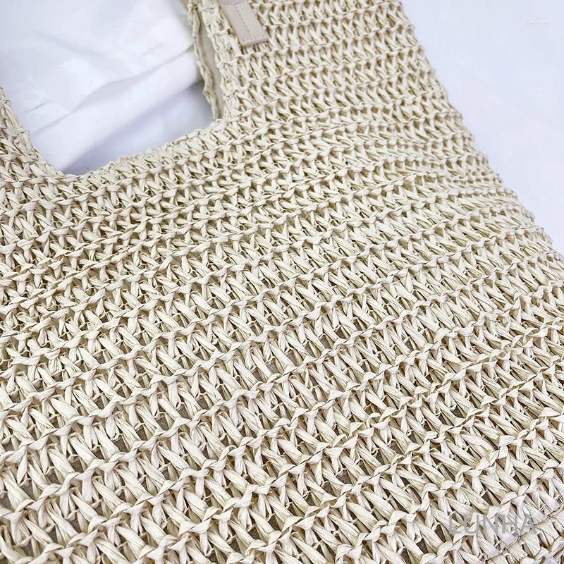 2025 new totes womens shoulder bags large capacity tophandle handbag hollow paper straw woven bag simple casual zhanyishengli