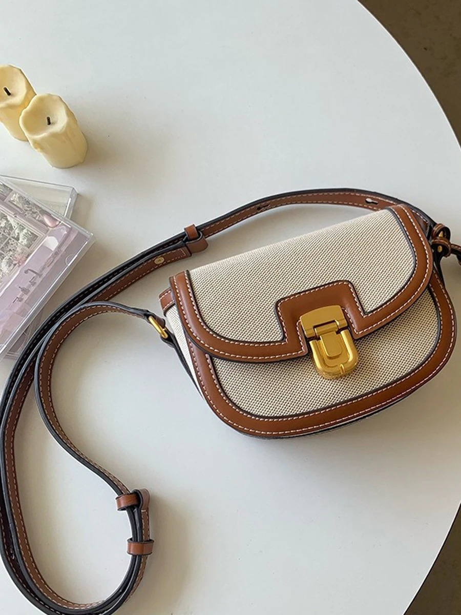 small contrasting canvas retro single shoulder cross body horse saddle bag241018