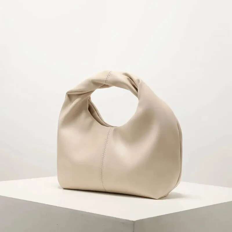 New Elegant Fashionable Twisted Square Solid Color Top Handbag Simple And Versatile Commuter Bag