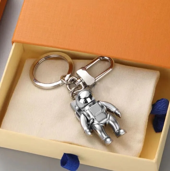Luxurys designers Keychain Car Key chain Solid color monogrammed Keychains Fashion Leisure astronaut Men Women Bag Pendant Accessories 3 options good nice Z 10.19