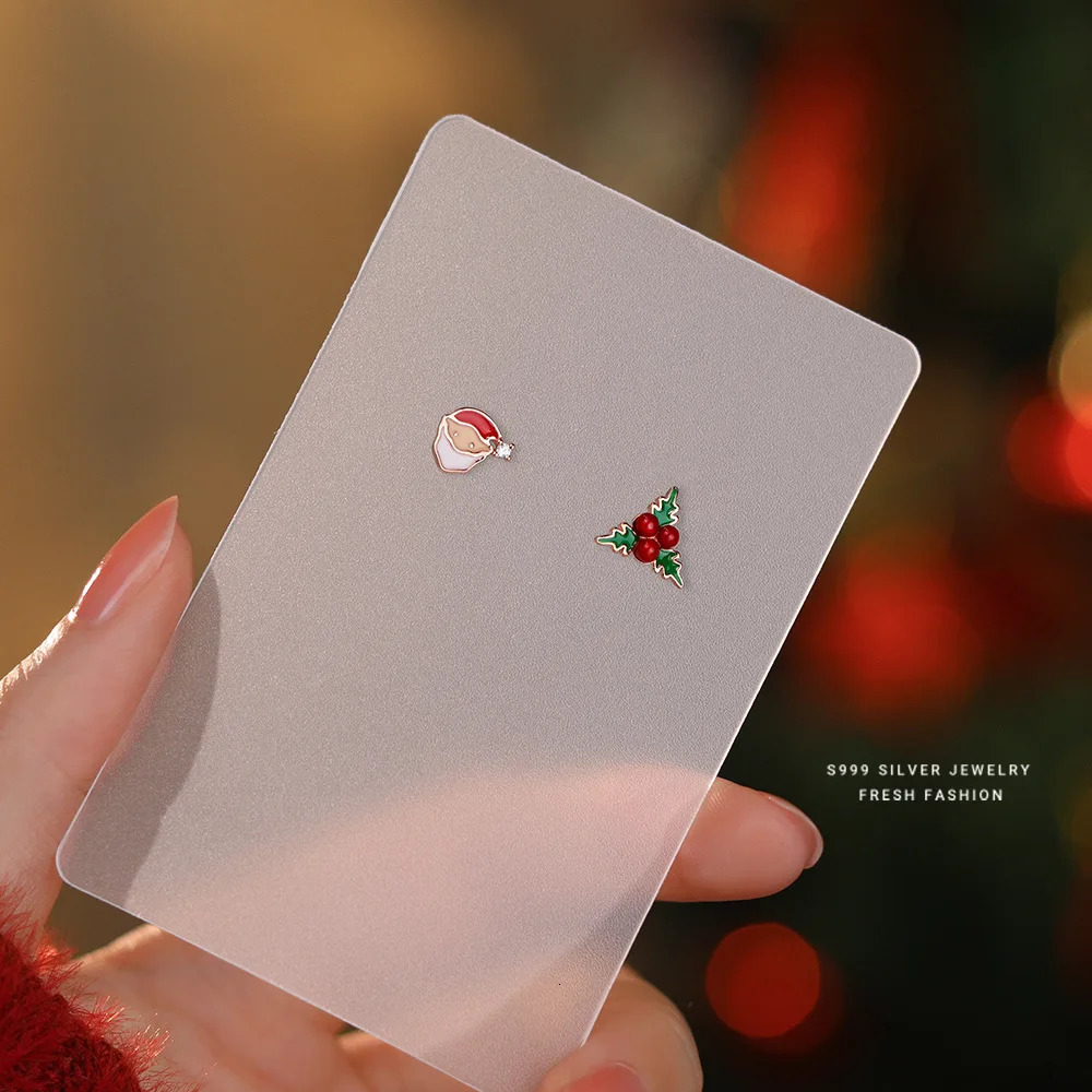 S999 pure silver cute Santa Claus cartoon asymmetrical stud earrings suitable for beautiful Christmas gifts for female students 241018
