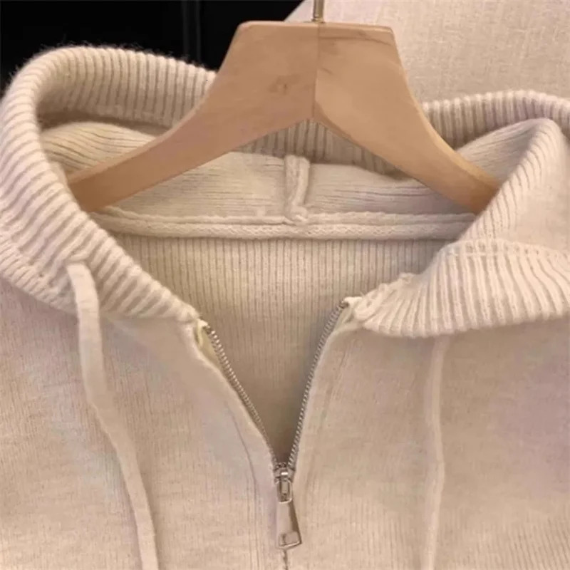 Spring and Autumn womens hooded sweater cardigan top womens loose zipper knitted jacket womens fashionable long sleeved jacket 241019