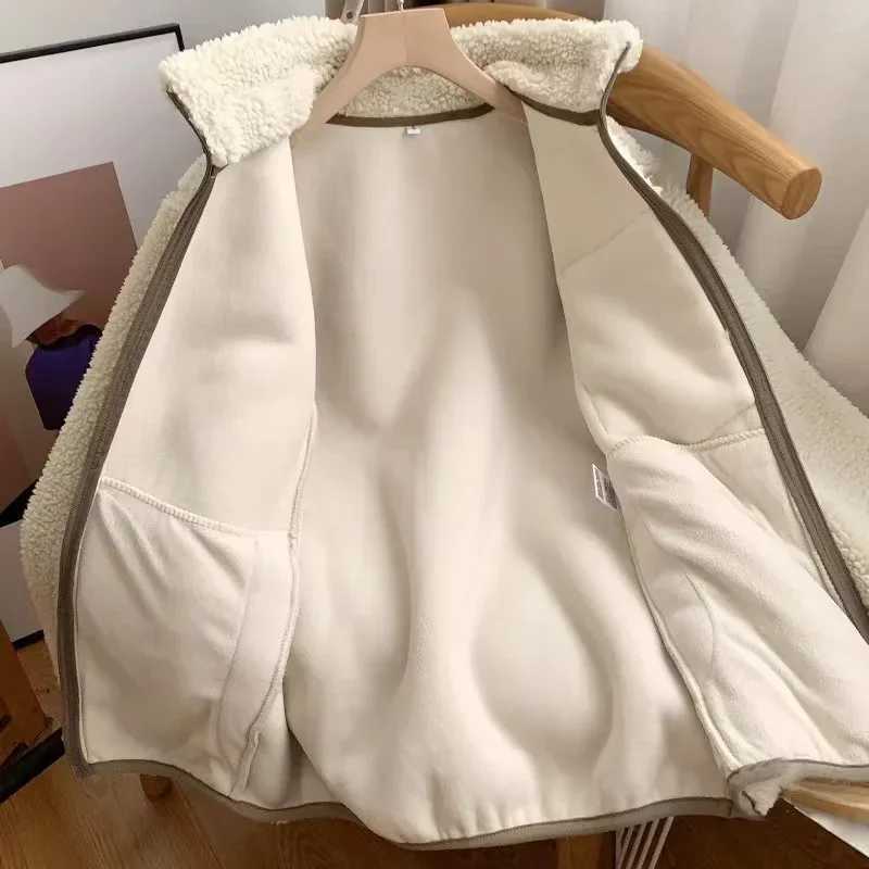 Fashion cashmere jacket womens autumn new item pocket zipper long sleeved loose stand collar comfortable warm jacket W241019