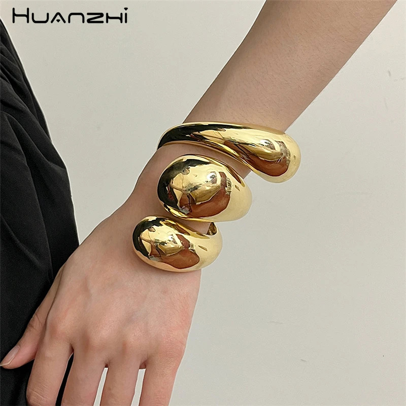 HUANZHI Retro Geometric Smooth Spiral Water Drop Opening Bracelet Metal Heavy duty Cuff Bracelet Womens Jewelry 2024 Edition 241018