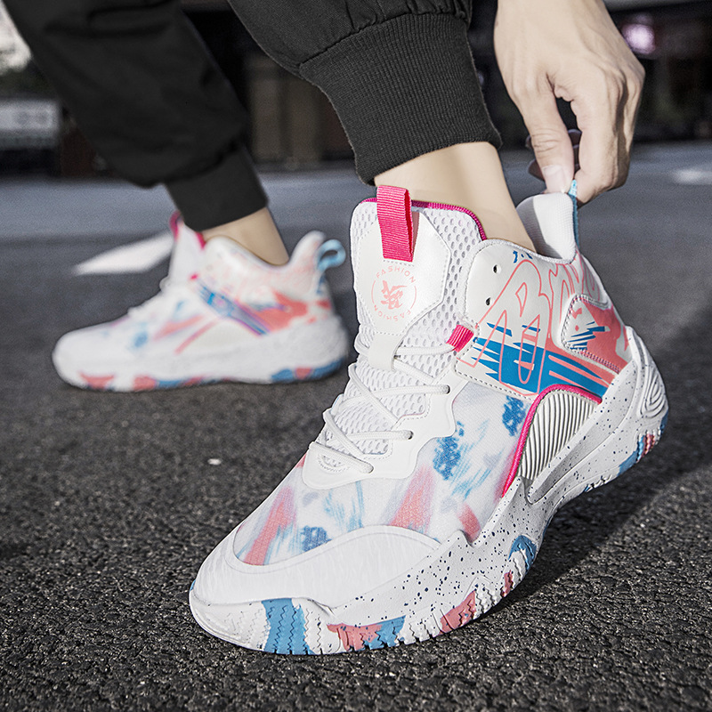 A pair of newly released mandarin duck basketball shoes, men's high top boots, sneakers, and trendy sports shoes for students on concrete ground