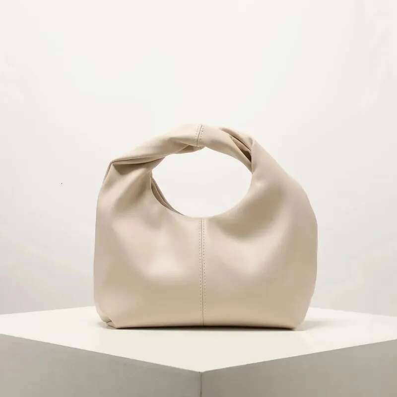 New Elegant Fashionable Twisted Square Solid Color Top Handbag Simple And Versatile Commuter Bag