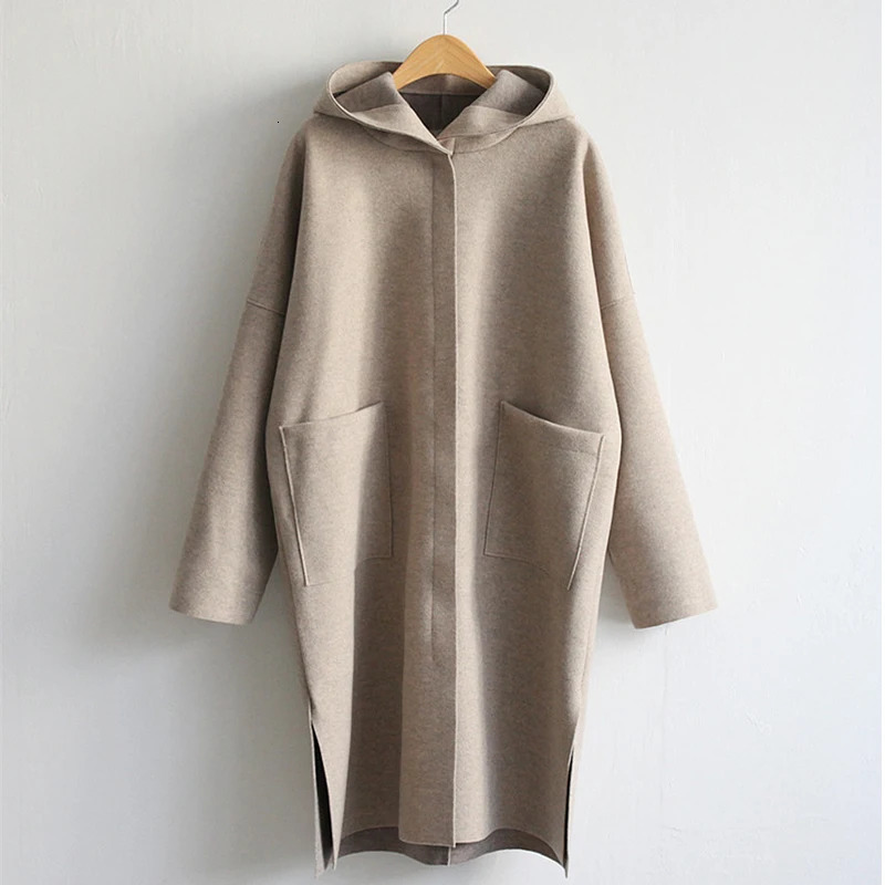 Fashion autumn winter Korean wool coat womens hooded cashmere slit pocket loose cloak long sleeved solid color windproof machine 241019