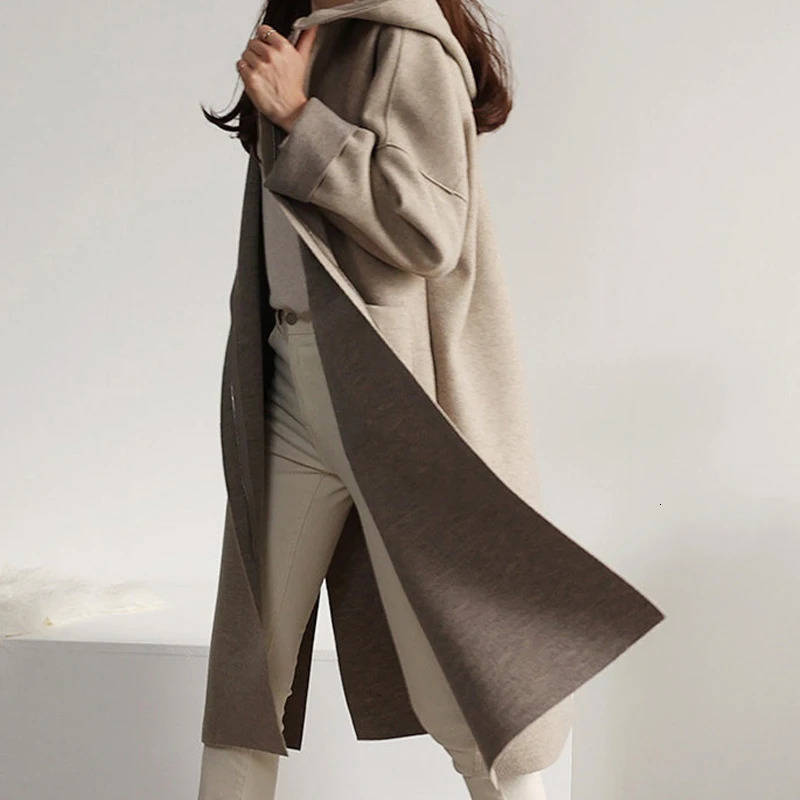 Fashion autumn winter Korean wool coat womens hooded cashmere slit pocket loose cloak long sleeved solid color windproof machine 241019