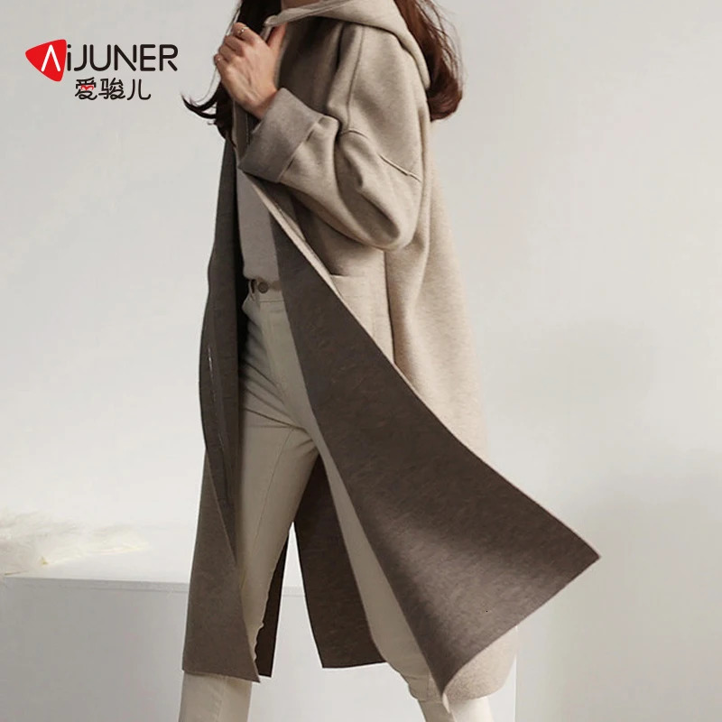 Fashion autumn winter Korean wool coat womens hooded cashmere slit pocket loose cloak long sleeved solid color windproof machine 241019