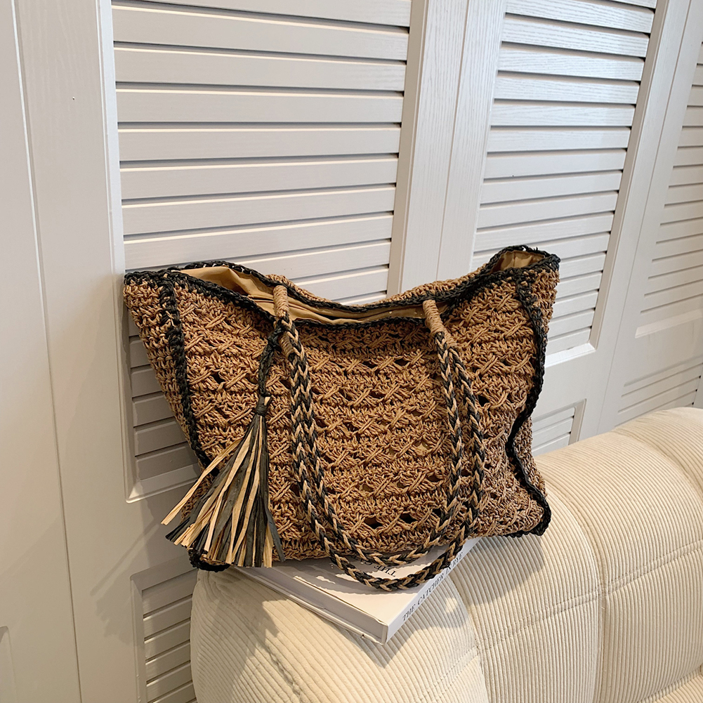 New designer women's woven straw handbag with hollow tassel shoulder, solid color crochet handbag, women's summer beach bag