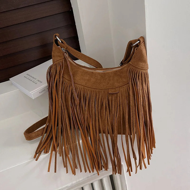 Retro tassel large capacity bag for womens autumn and winter handbag womens shoulder bag simple cross shaped bag 241021