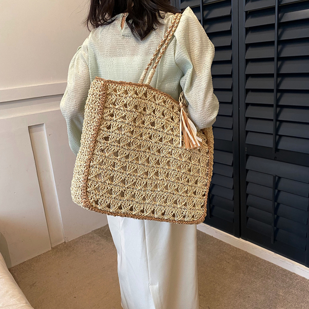 New designer women's woven straw handbag with hollow tassel shoulder, solid color crochet handbag, women's summer beach bag