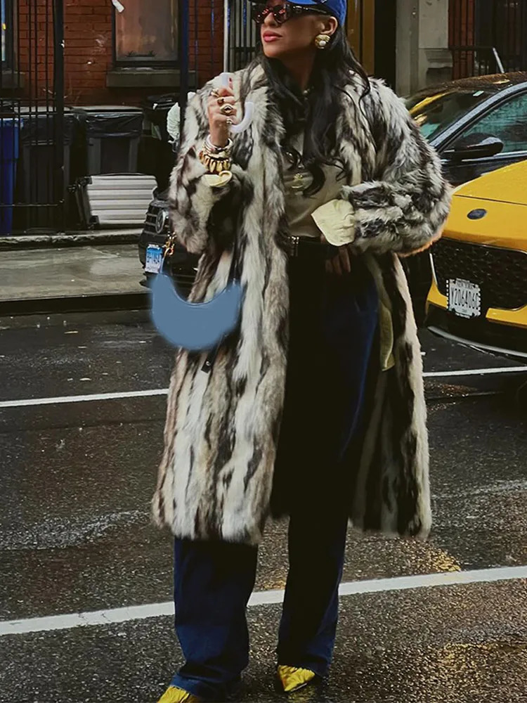 Elegant round neck full sleeve warm womens jacket compared to fluffy faux fur long jacket autumn and winter womens jacket 241021