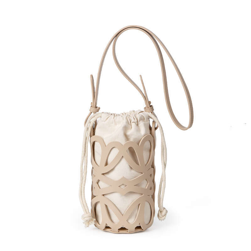 Korean hot Style Crossbody Bag: New Design Hollowed Out Drawstring Canvas Cylindrical Shoulder Bag