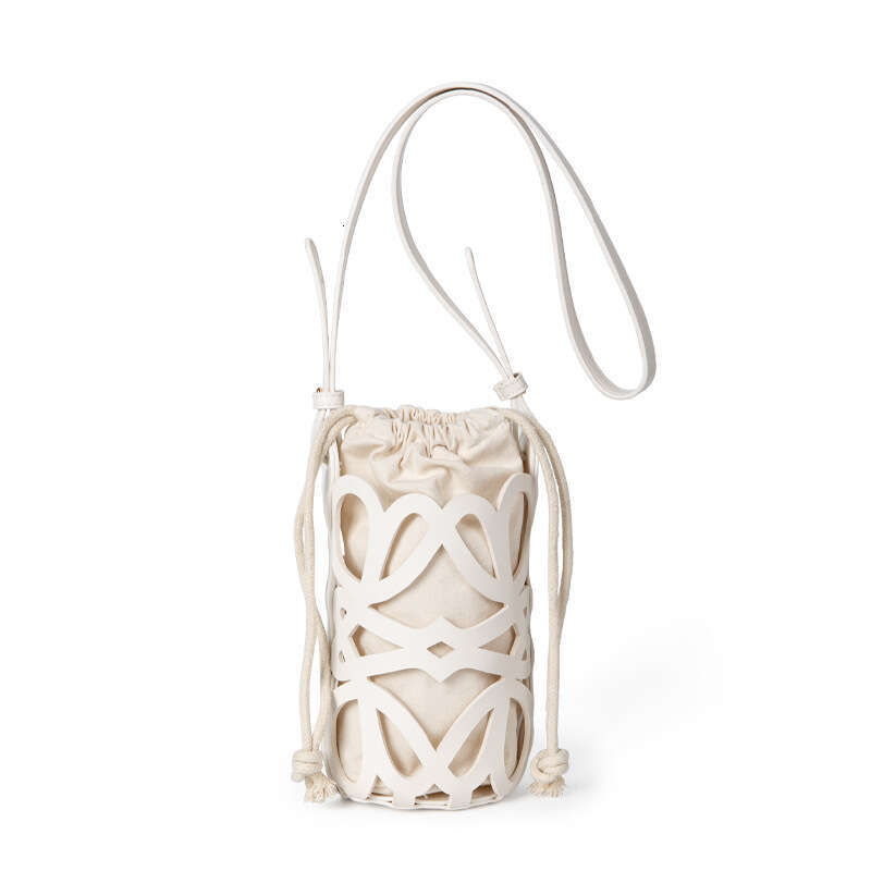 Korean hot Style Crossbody Bag: New Design Hollowed Out Drawstring Canvas Cylindrical Shoulder Bag