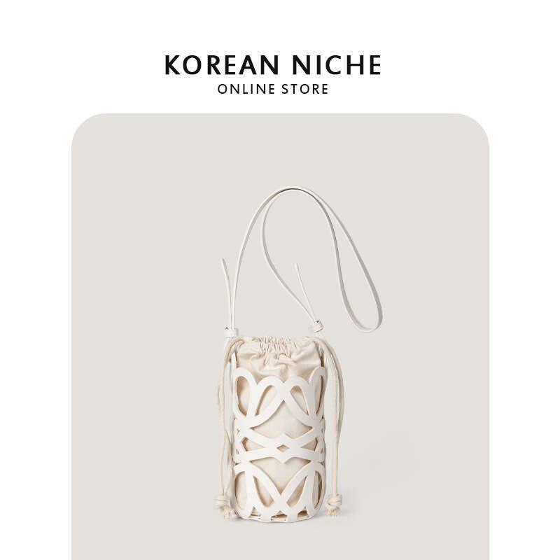 Korean hot Style Crossbody Bag: New Design Hollowed Out Drawstring Canvas Cylindrical Shoulder Bag