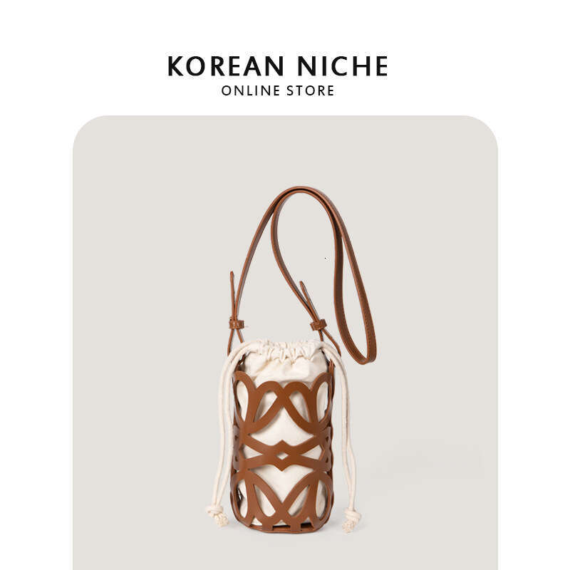 Korean hot Style Crossbody Bag: New Design Hollowed Out Drawstring Canvas Cylindrical Shoulder Bag