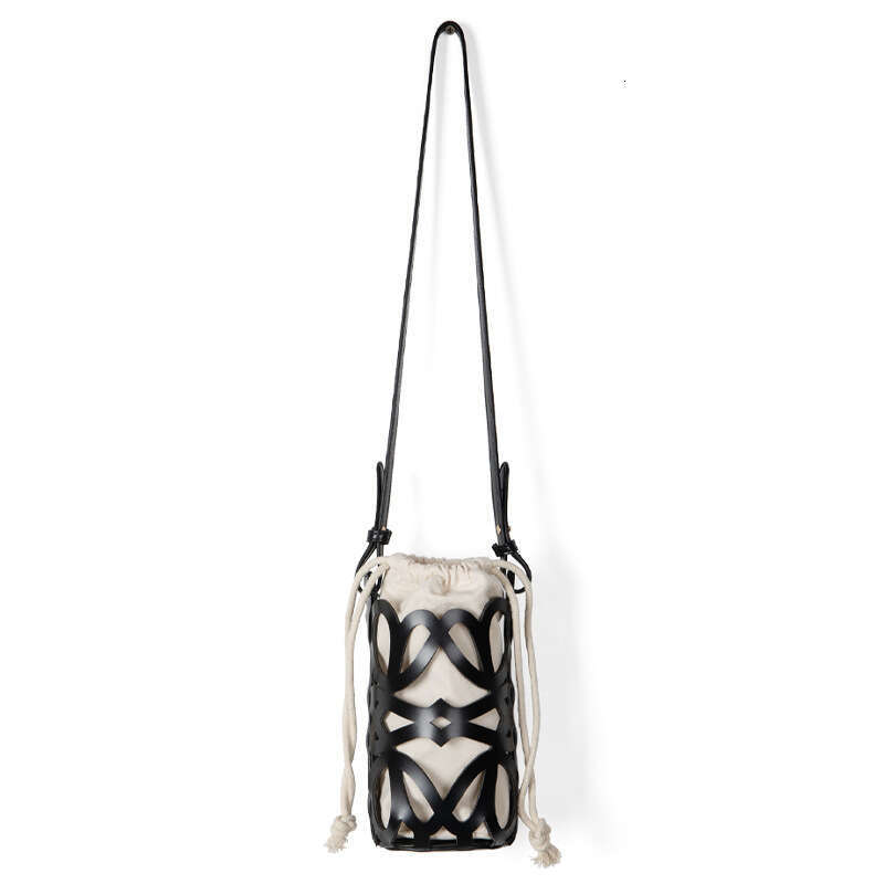 Korean hot Style Crossbody Bag: New Design Hollowed Out Drawstring Canvas Cylindrical Shoulder Bag