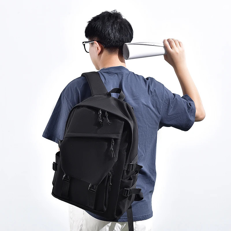 A 15 inch polyester waterproof solid color mens backpack fashionable couple computer backpack 241023