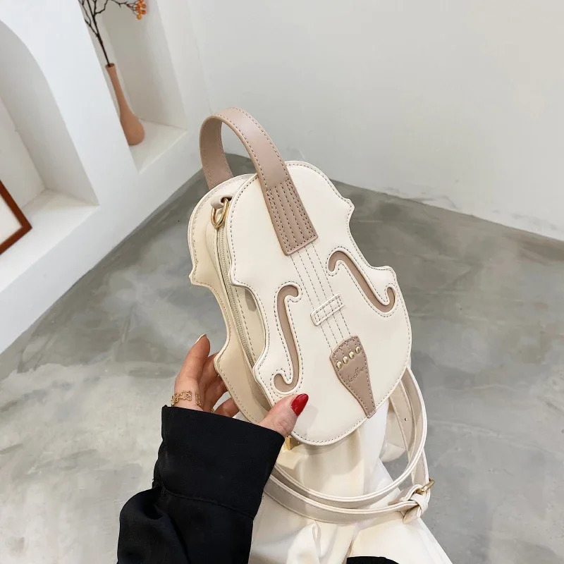 Spring/Summer Fashion Womens Handheld Backpack Selling Network Red Shoulder Ten Font Violin Bag 241023