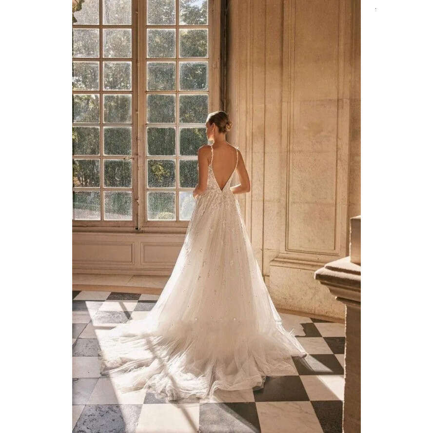 Sexy 2024 A New E Spaghetti Straps Wedding Dresses Backless Appliques Tulle Ruffles Long Bridal Gowns Plus Size Bc16587 ppliques