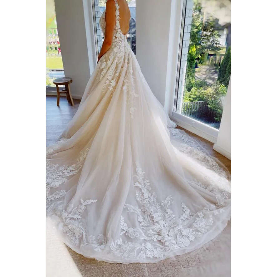 Modern Lace Wedding Dresses A Line Tulle Backless V Neck A Line Bohemian Bridal Gowns With Appliques Ruffles Robe De Maraige Bc14398