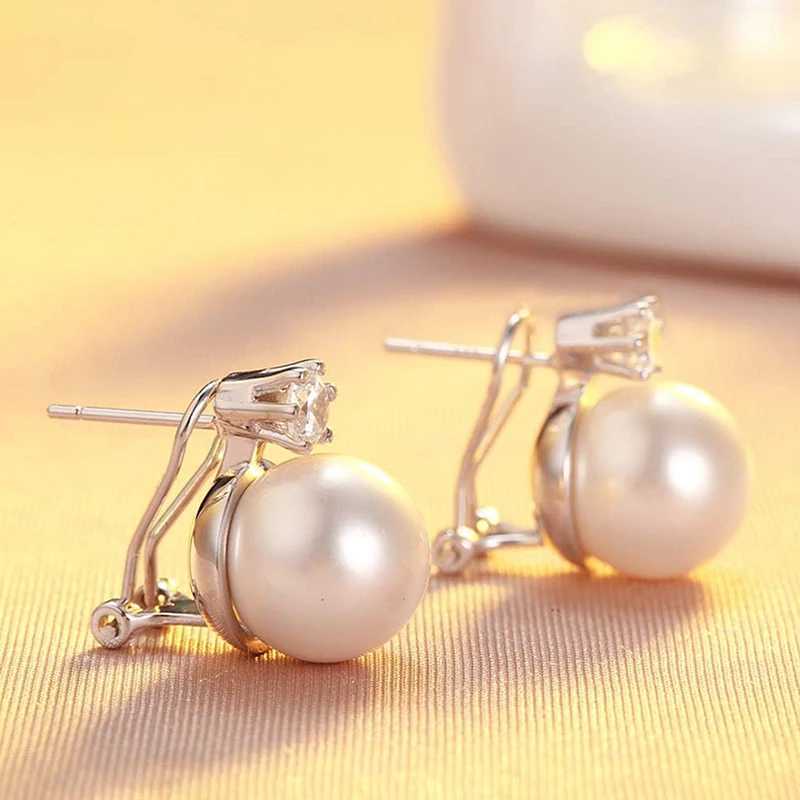 Huitan Tren Korean style perforated stud earrings for womens elegant simulated pearl jewelry used for engagement and sparkling CZ Accordies W241023