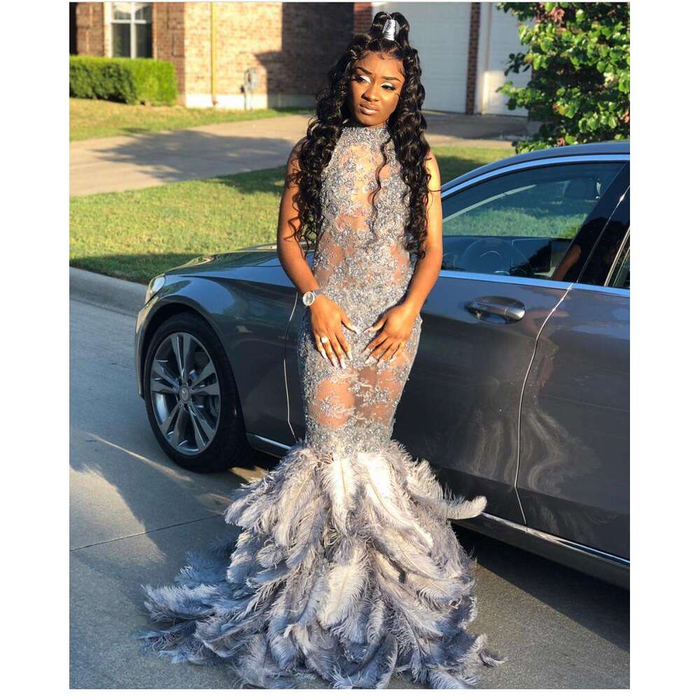 FATAPAESE Full Bodice Rhie Prom Dress V-Cut Necke Open Back with Lower Zipper Closure Feather Train MermaidGown