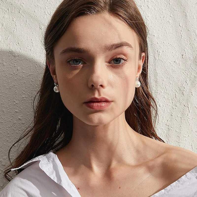 Huitan Tren Korean style perforated stud earrings for womens elegant simulated pearl jewelry used for engagement and sparkling CZ Accordies W241023