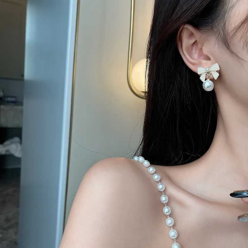 Sweet Girl Earrings Are Thin Pearl Bow Earrings Fashion New Temperament Net Red French Earrings Womens Clothing Sales OorbellenX241023